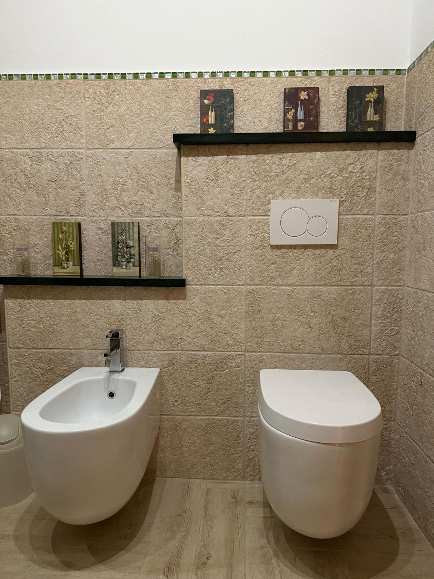 The Refuge Apartment Porto Torres Bagian luar foto