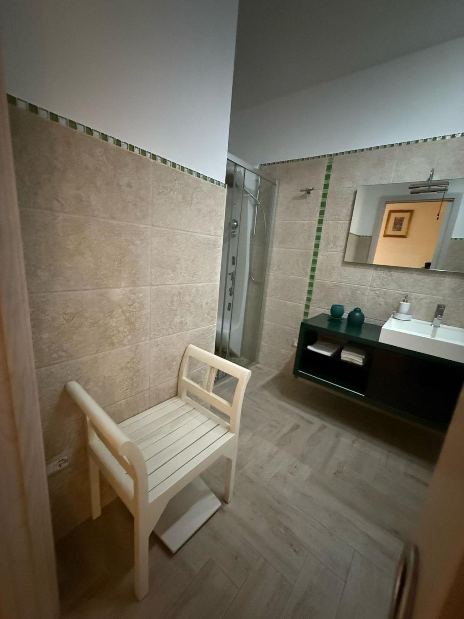 The Refuge Apartment Porto Torres Bagian luar foto