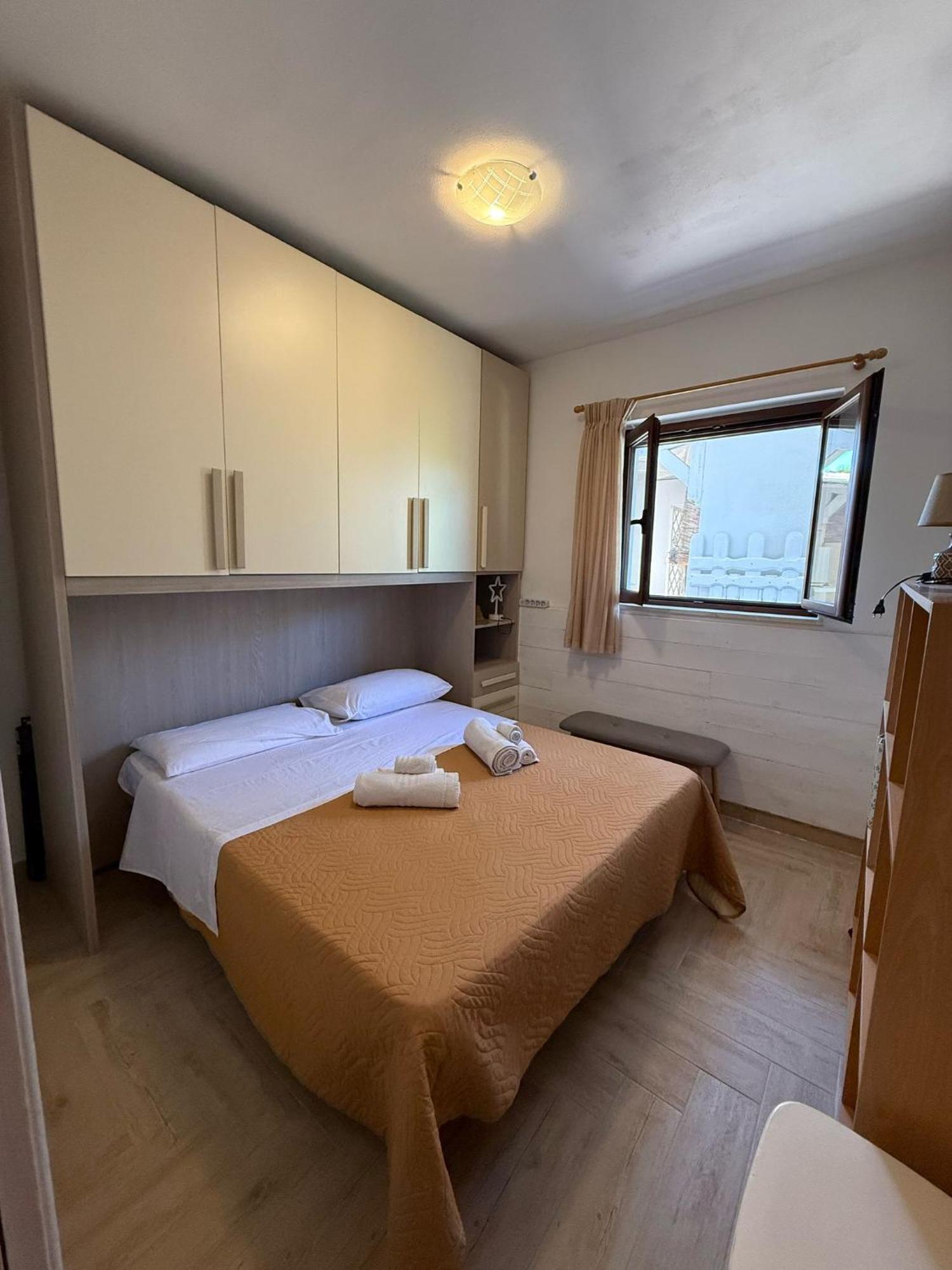 The Refuge Apartment Porto Torres Bagian luar foto